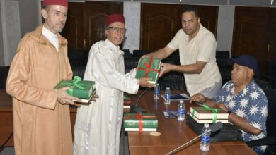 المجلس العلمي لطاطا يوزع المصحف المحمدي المترجم على أفراد الجالية